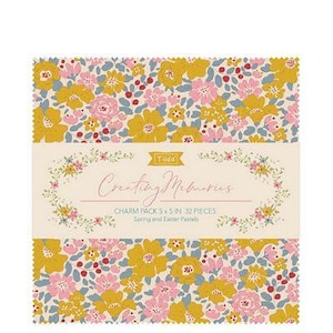 May include: A charm pack of 32 fabric squares featuring a floral pattern in shades of yellow, pink, and blue. The fabric squares are 5.5 inches each and are labeled "Creating Memories" with the text "Spring and Easter Pastels".
