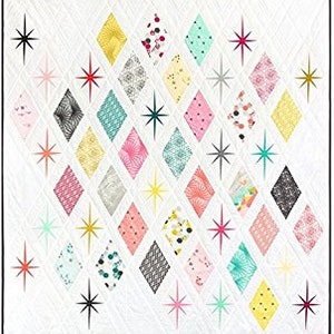 May include: A quilt pattern with a white background and a diamond pattern in various colors, including pink, yellow, blue, and green. The diamonds are surrounded by black starbursts.