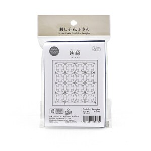 May include: A packaged Sashiko sampler kit. The kit includes a navy blue fabric with a floral pattern, instructions, and the text "English instruction included." The finished size is approximately 33 x 33 cm. The package also includes the text "Hana-Fukin Sashiko Sampler."
