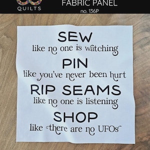 May include: Fabric panel with the text "SEW like no one is watching, PIN like you've never been hurt, RIP SEAMS like no one is listening, SHOP like there are no UFOs." Panel measures approximately 34.3 cm x 34.3 cm for trimming to 31.8 cm x 31.8 cm.