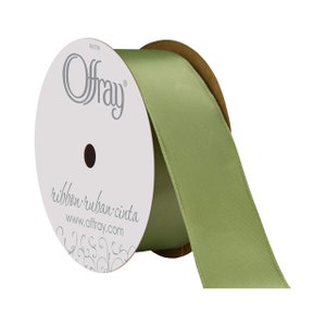 May include: A spool of sage green satin ribbon with the Offray brand name and website printed on the label. The ribbon is 1.5 inches wide.