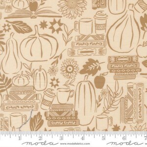 May include: Cream-coloured fabric featuring a repeating pattern of pumpkins, books, coffee cups, sunflowers, and leaves in a warm brown hue. The design has an autumnal theme.