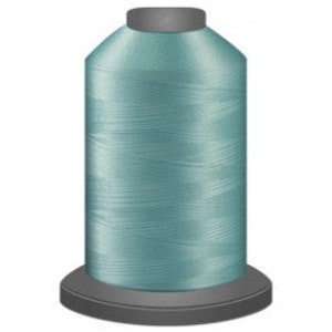 May include: A spool of light blue sewing thread.