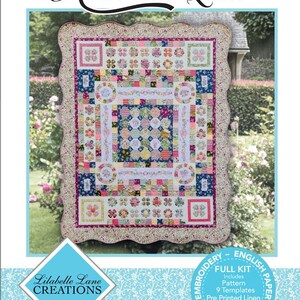 May include: A colorful quilt kit titled "Arabella Quilt" with floral and geometric patterns. The kit includes a pattern, templates, pre-printed linen, and papers. The Lilabelle Lane Creations logo is visible.