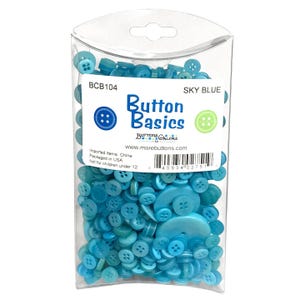 May include: A clear plastic package filled with sky blue buttons of various sizes and shapes. The package has a label that reads "Button Basics" and "SKY BLUE". The buttons are a mix of round and decorative shapes, perfect for sewing or crafting projects.