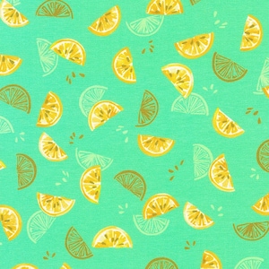 May include: A fabric with a repeating pattern of yellow and light green lemon slices on a bright teal background. The lemon slices are in various orientations, with some having a brown outline.