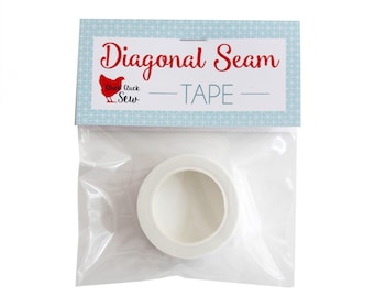 May include: A roll of white diagonal seam tape in a clear plastic bag with a label that says "Diagonal Seam Tape" and a red chicken illustration with the text "Cluck Cluck Sew".