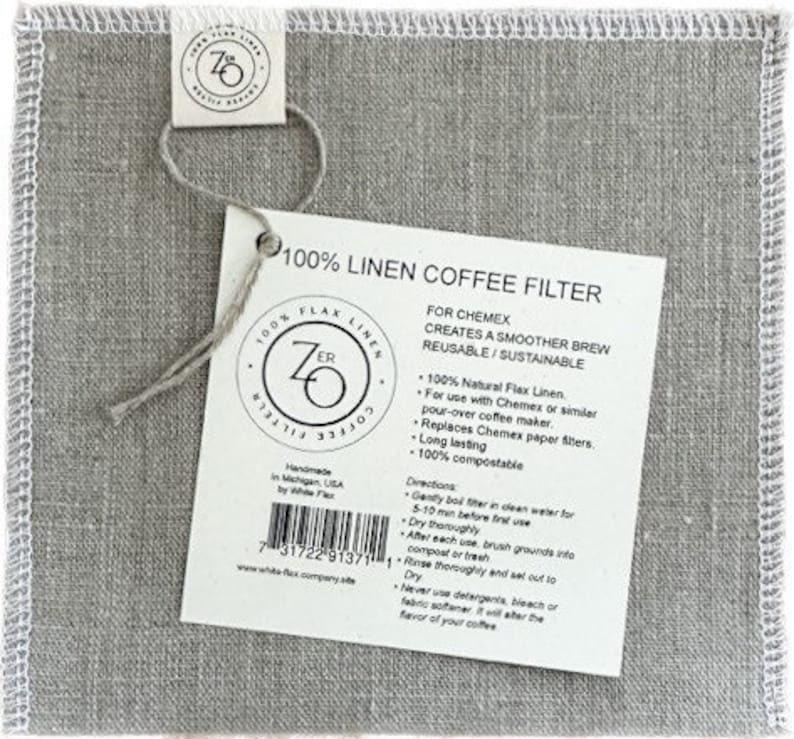 May include: A white linen coffee filter with a tag that reads "100% Linen Coffee Filter" and "For Chemex Creates a Smoother Brew Reusable/Sustainable". The tag also includes instructions for using the filter.