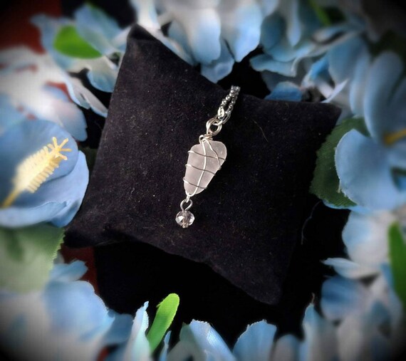 White Sea glass pendant with charm