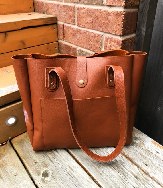 leather tote with outside pockets