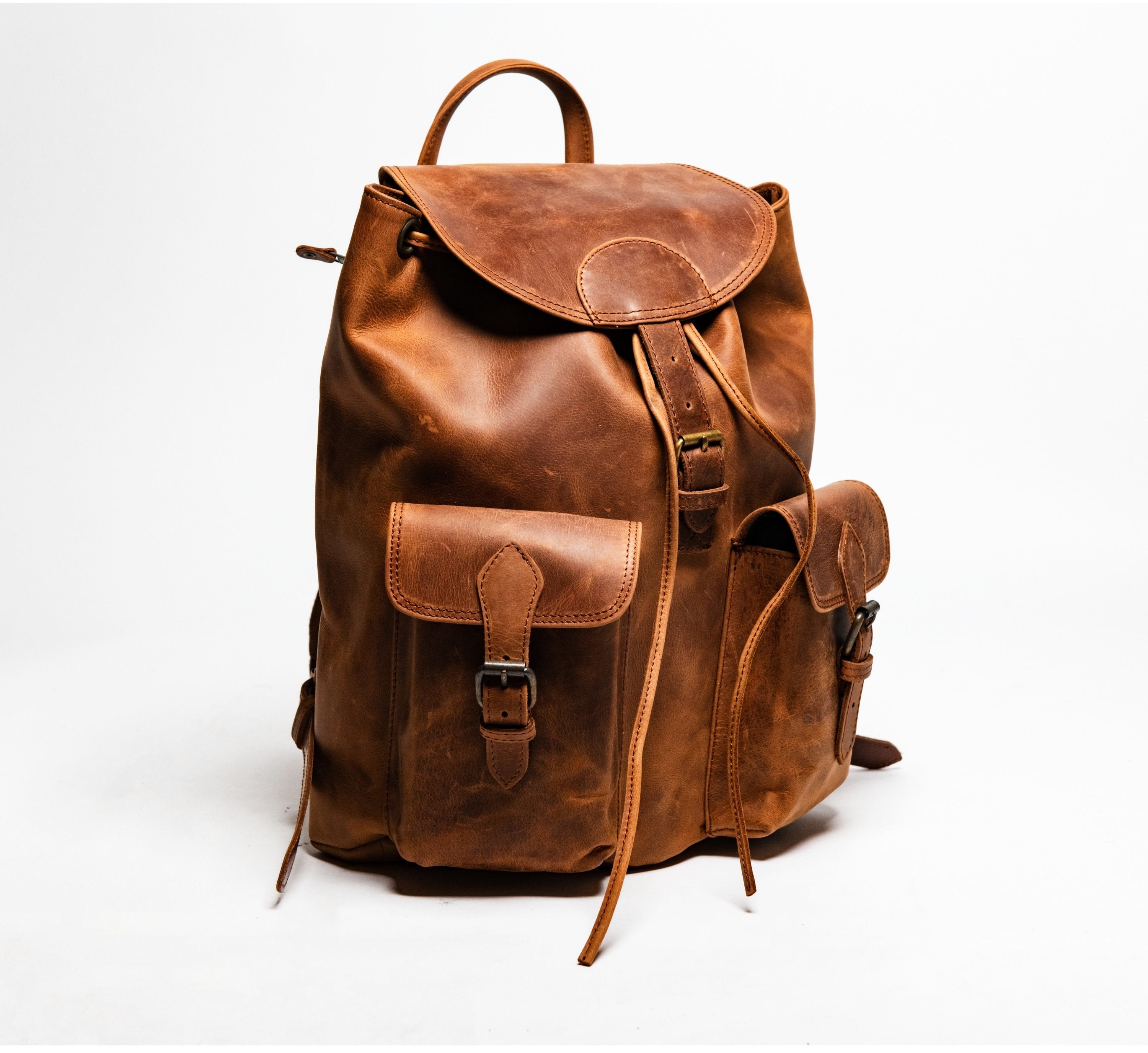 レザー製ブラウンバックパック il_fullxfull.1981930358_ades.jpg