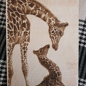 Giraffe mother and her baby,burned image    on wood pyrography(A4 size)