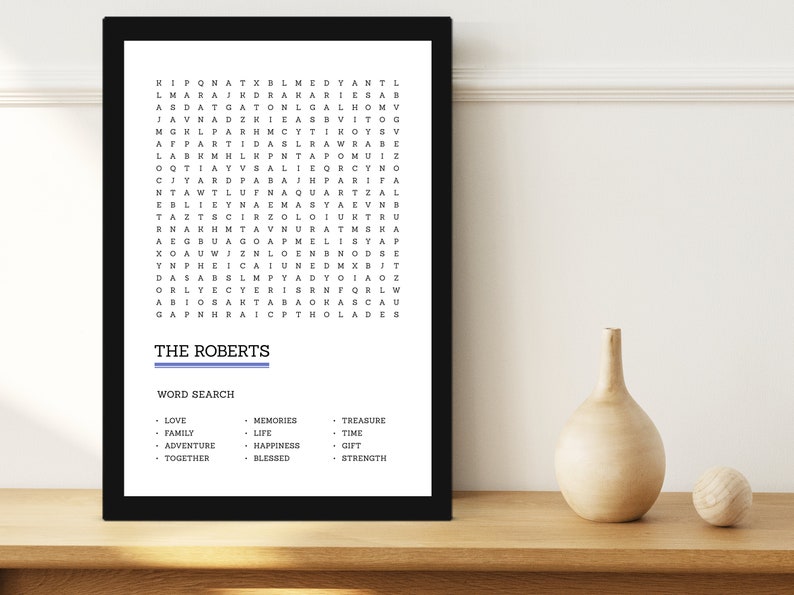 May include: A black and white word search puzzle with the title "The Roberts" and a list of words to find, including "love", "family", "adventure", "together", "memories", "life", "happiness", "blessed", "treasure", "time", "gift", and "strength".