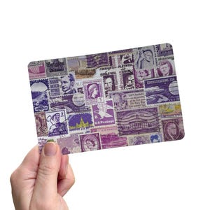May include: A rectangular collage of vintage postage stamps in shades of purple and white. The stamps display portraits, buildings, and text, including "US Postage" and "Communications For". The collage is held in a hand against a white backdrop.