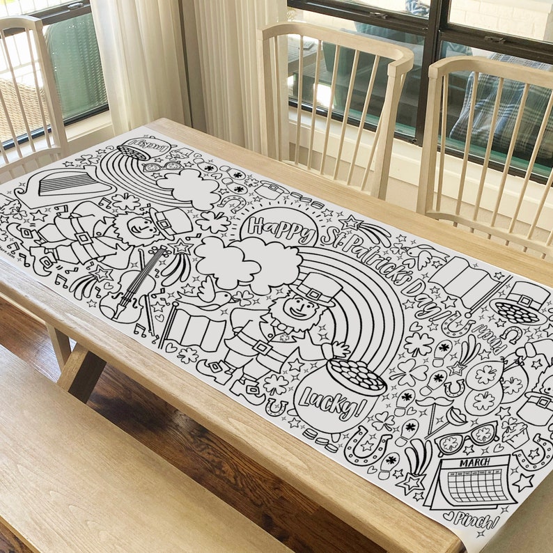 May include: Black and white coloring table runner featuring a St. Patrick's Day theme with leprechauns, rainbows, shamrocks, and the text "Happy St. Patrick's Day!" and "Lucky!"
