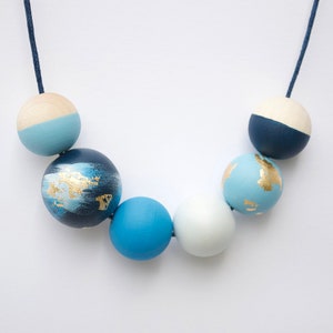 Navy blue bead necklace - wooden beads with gold leaf in coastal design