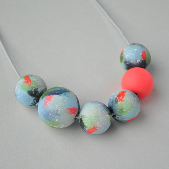 Pale green, blue, neon red bead necklace in arty coastal pattern, hand painted beads.