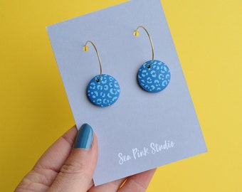 Blue leopard print hoop earrings - colourful statement earrings made with hand painted wooden beads.