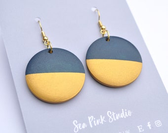 Navy and gold statement earrings with geometric design, made with hand painted wooden beads.
