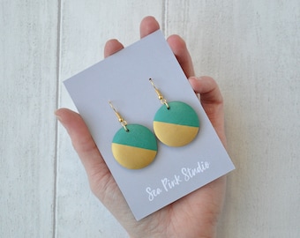 Emerald green and gold statement earrings with geometric design, made with hand painted wooden beads.