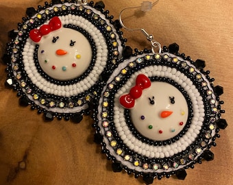 Handmade beaded earrings. Indigenous. Snow friends