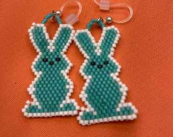 Handmade beaded earrings. Indigenous beading. Bunnies