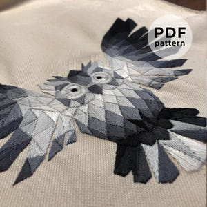 フクロウの幾何学的な刺繍模様