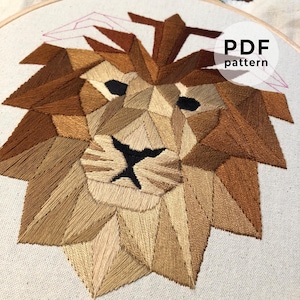 ライオンの幾何学的な刺繍模様