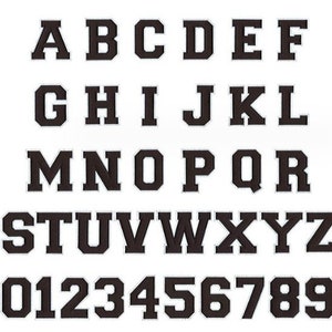 May include: Black and white alphabet and number iron-on patches. The letters are in a bold, blocky font.