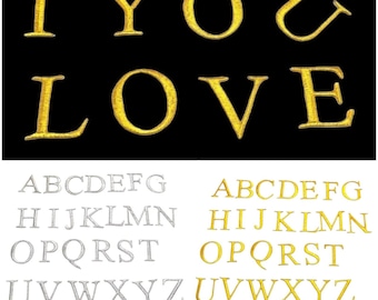 La correction de lettre de l'argent 3cm d'or corrige le fer sur la broderie d'alphabet