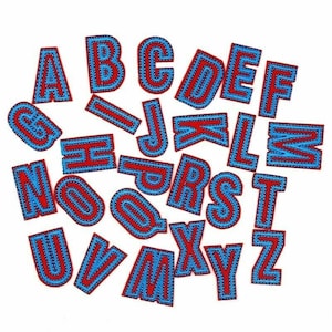 May include: A set of colourful felt alphabet letters in red and blue. The letters are individually cut out and have a blue outline with a red interior.