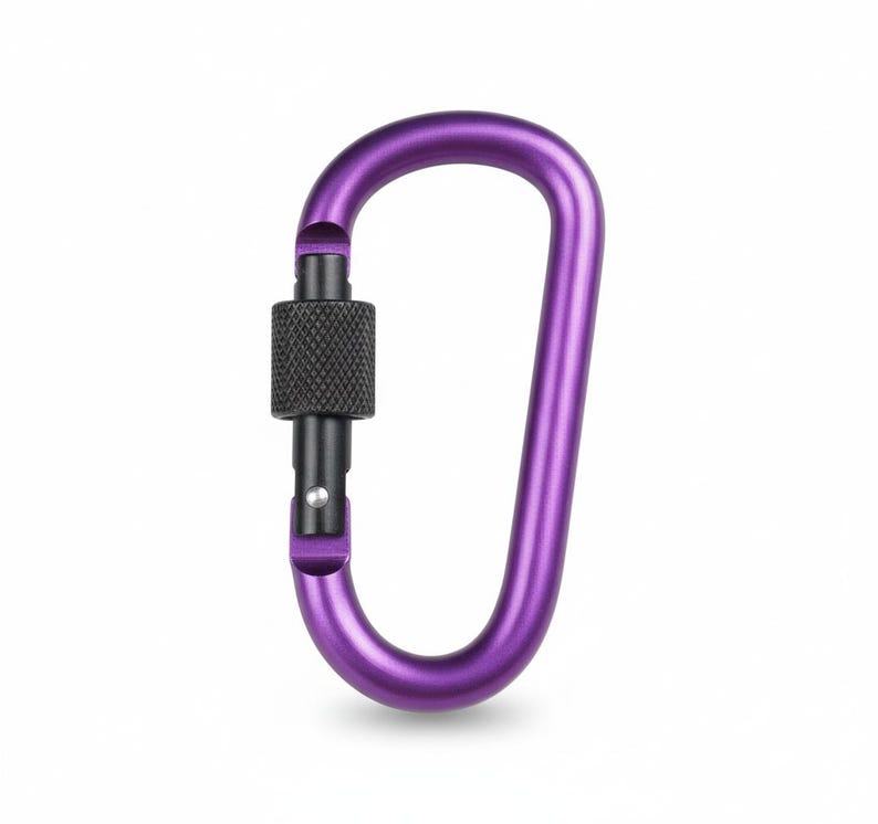 May include: A purple carabiner with a matte finish, featuring an asymmetrical D-shape design. The device includes a black metal screw-gate locking mechanism with a textured, knurled surface for grip, and a spring-loaded gate closure.