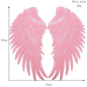 May include: A pair of pink angel wings with a delicate lace design. The wings are 33 cm tall and 34 cm wide. Have glue 26g.