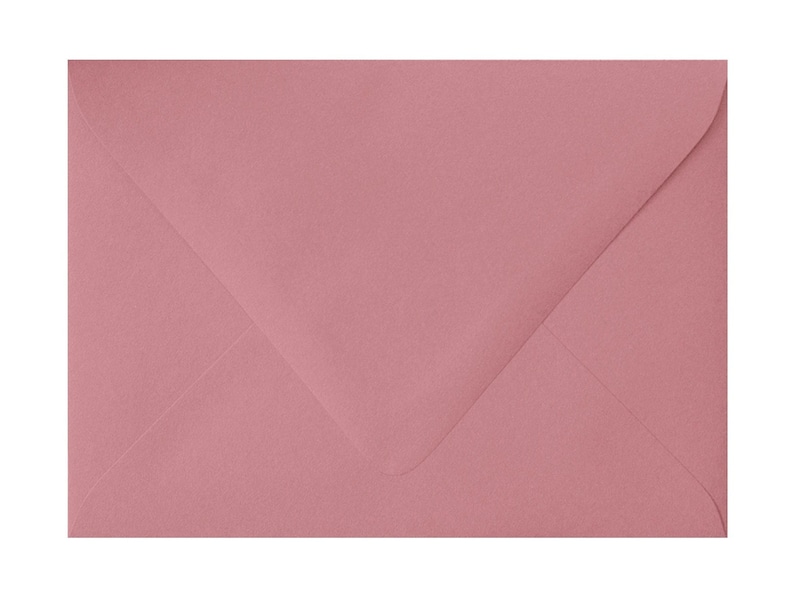 May include: A light pink envelope.