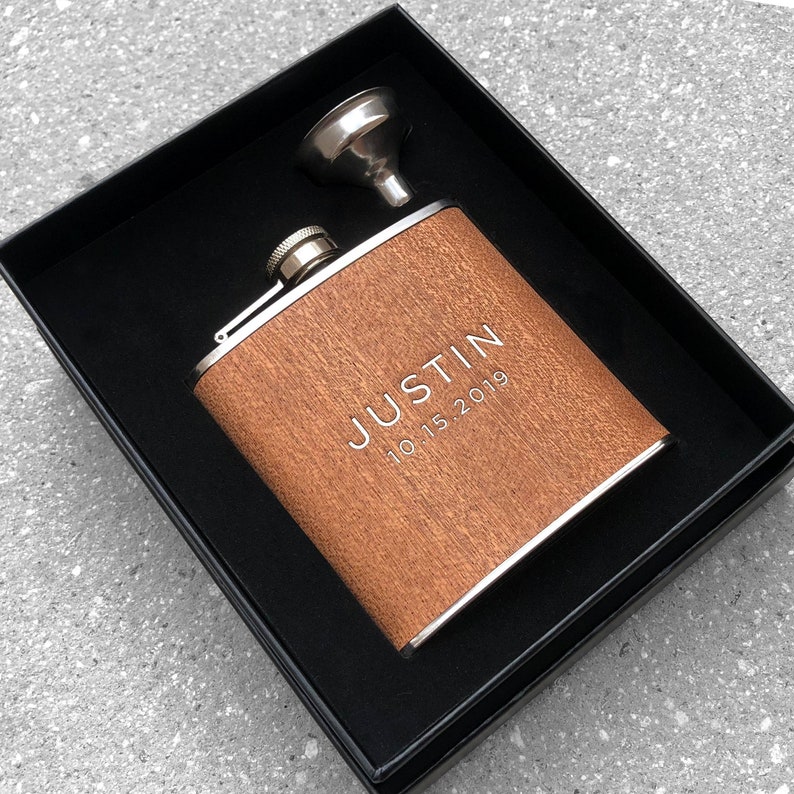 a personalized wood flask is custom laser engraved with your brother name, his birthdate and is made of stainless steel