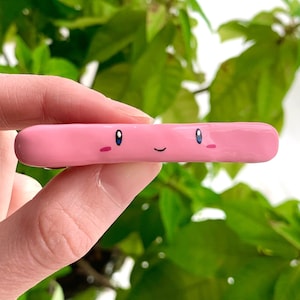 Handmade Kirby hair clip, polymer clay Nintendo cute barrette, pink gamer girl and anime lover accessories, unique cool Kirby jewelry merch