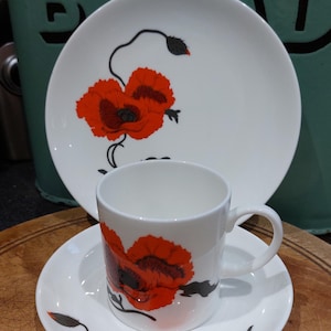 Vintage Susie Cooper Fine bone China Wedgwood Trio Corn Poppy. Vintage coffee can saucer and plate.
