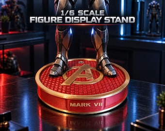 May include: A circular 1/6 scale figure display stand with a red honeycomb textured top and a gold Avengers logo in the center. The side of the base is red with a gold rim and features the text MARK VII. The legs of a metallic figure stand on top.