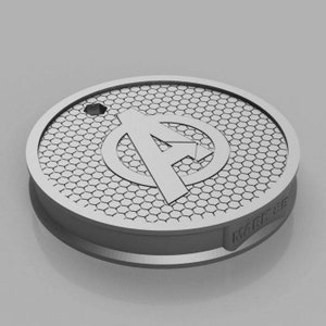 May include: A silver-colored round metal coaster with a hexagonal pattern and the Avengers logo in the center. The logo is a stylized "A" inside a circle with an arrow pointing to the right. The coaster has the word "WARRIORS" printed on the side.