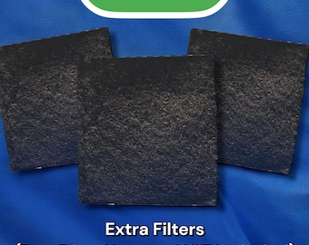 May include: Three black square-shaped air filters for a water filter system. The text "F1 ULTRA" is visible in green on a white background. The text "Extra Filters (Pre-Filter Housing NOT Included)" is also visible.