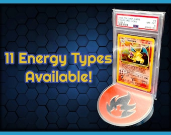 May include: A graded Pokemon card featuring Charizard from the Base Set, in a protective case. The card is graded NM-MT 8, with a PSA label. The card is displayed on a red and silver stand with a fire symbol. The text "11 Energy Types Available!" is displayed in yellow letters on a blue background.