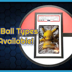 May include: A Pokemon card featuring Pikachu in a silver frame. The card is graded Gem Mint 10 and is a 15th Anniversary Promo card. The card is displayed in a black and red Pokeball-shaped display stand. 6 Ball Types Available! is written in yellow text on a blue background.