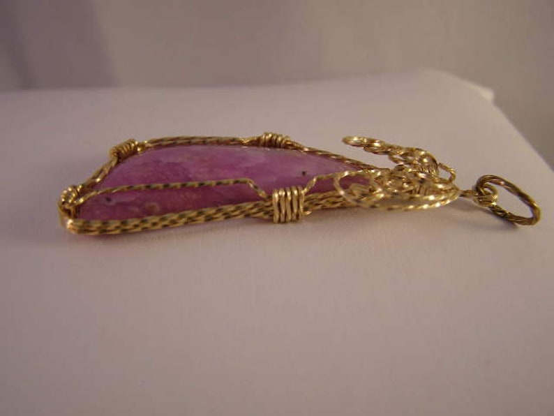 # GFP-001 Sugilite Cabochon Gold Filled Wrap Pendant 56mm Long 31.0cts