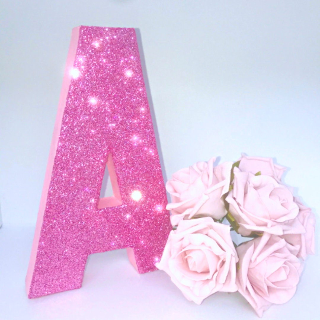 Glitter letters with pink outline by Downtownteachermom