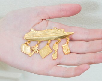 80s gold metal cruise ship pin brooch