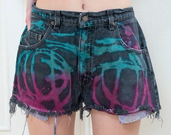 90s cut off levis jean shorts tie dye 31 waist | black denim medium rainbow tie dyed cut offs | multicolor tie dye frayed jean shorts