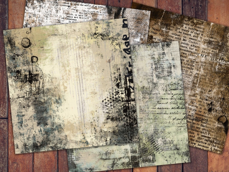 May include: A selection of textured paper sheets with a vintage aesthetic. The papers feature layered designs with faded colours, including beige, brown, and black, with hints of text and abstract patterns. The papers are arranged on a wooden surface.