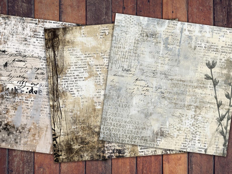 May include: Four sheets of vintage-style paper with aged textures and handwritten script. The papers feature a mix of beige, grey, and white tones, with visible text and numbers. A sprig of flowers is visible on one sheet. The papers are arranged on a wooden surface.