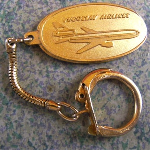 Vtg Keyring JAT Yugoslav Airlanes, Keychain, Ex Yugoslavia, color Gold, Snake