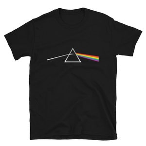 May include: Black t-shirt featuring a graphic of a prism and a rainbow, inspired by the album cover for Pink Floyd's "Dark Side of the Moon".